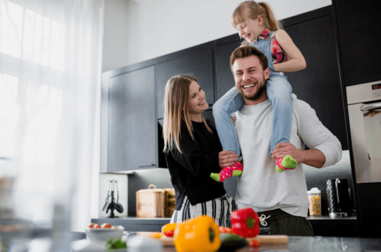 Family having fun in their kitchen