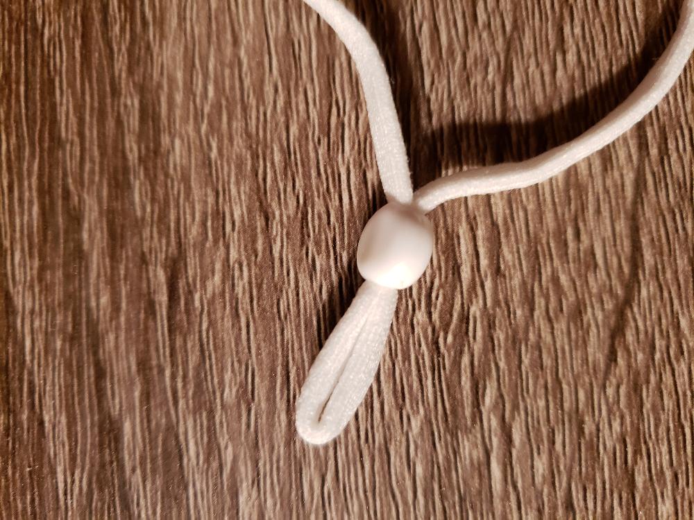 Use craft beads to help make your mask instantly adjustable