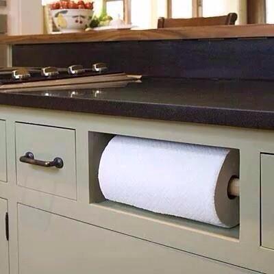 Roll with this clever place to stash your paper towel holder!